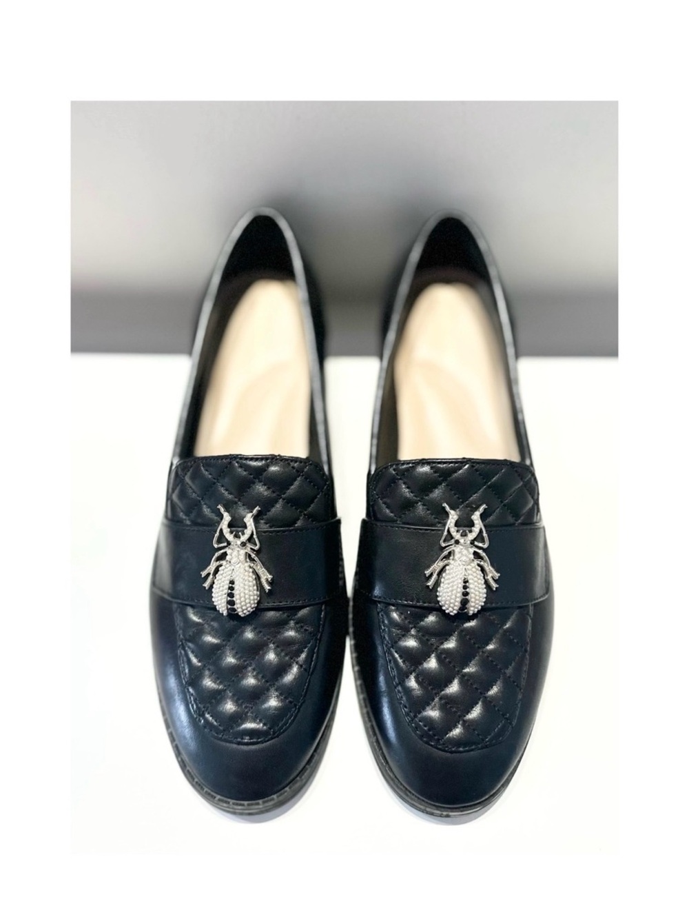 Black Quilted Loafers with Silver Bee Accent